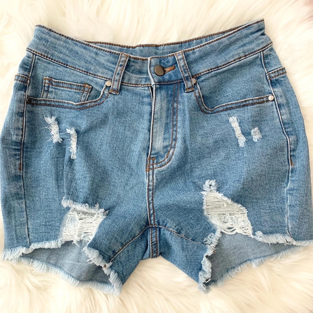 Distressed denim shorts